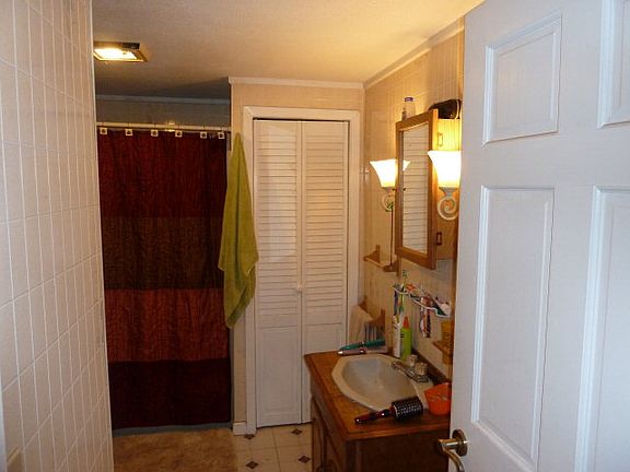 Bathroom has linen closet 