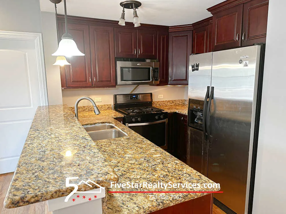 Building Photo - 6112 W Diversey Ave #D-1