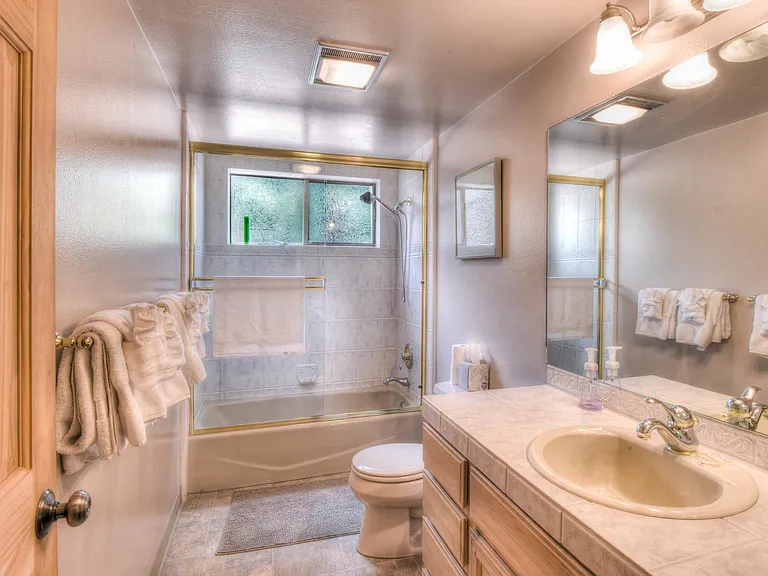 Queen bedrooms share hallway bath