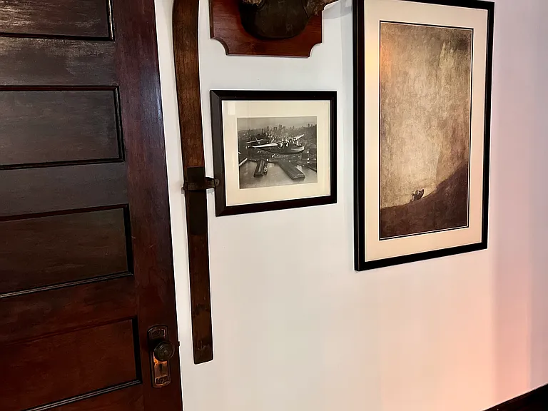 One of the hallways adorned with unique art pieces and antiqus.