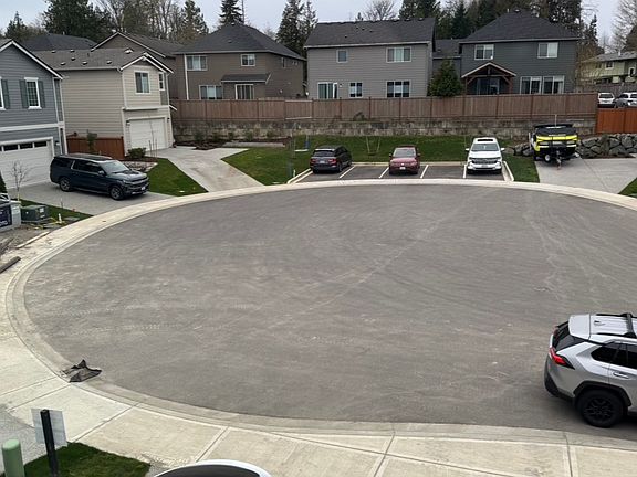 Large area for kids to skate / play or additional parking in center. Visitor parking is shown in background.