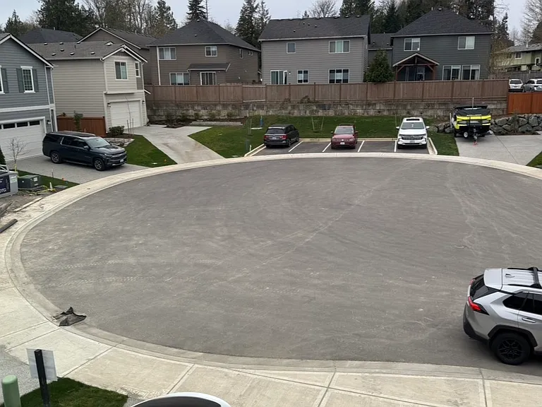 Large area for kids to skate / play or additional parking in center. Visitor parking is shown in background.
