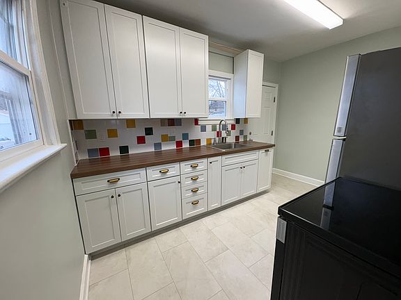 New cabinets, disposal and flooring. Bright light filled kitchen with brand new appliances.