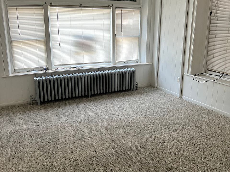 Front of house by entry door-living room?