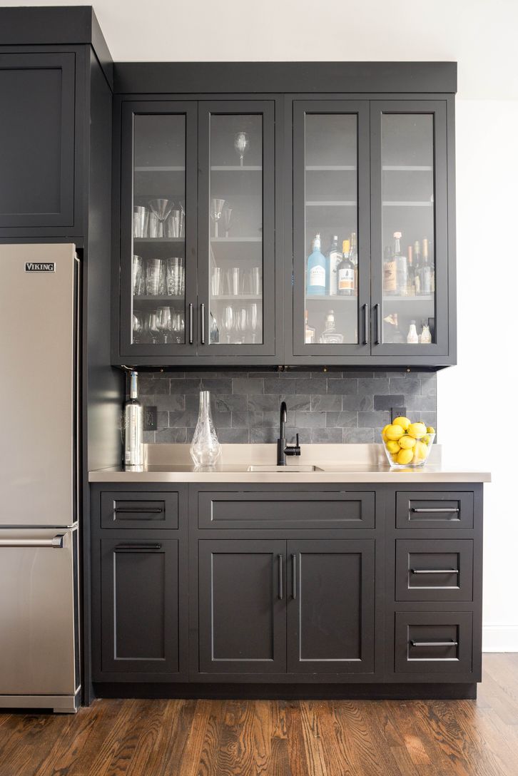 Wet bar with Viking french door fridge in TV room