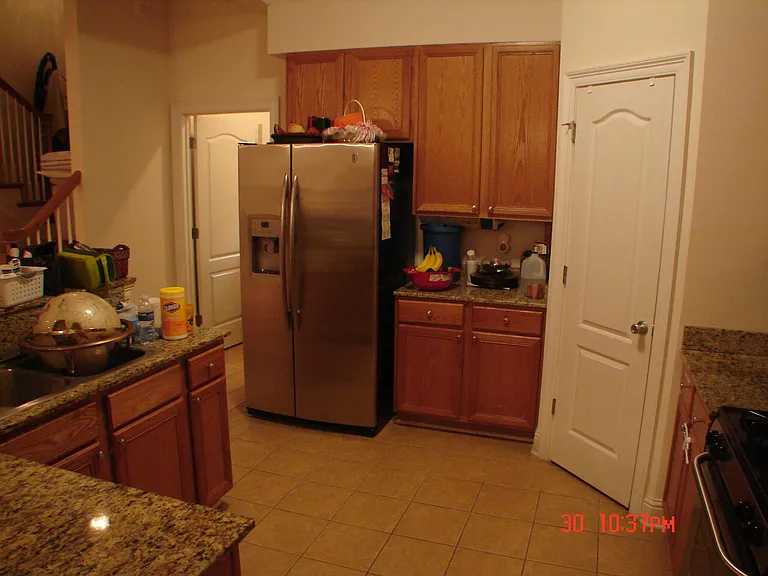 Pantry door on the right (kitchen)