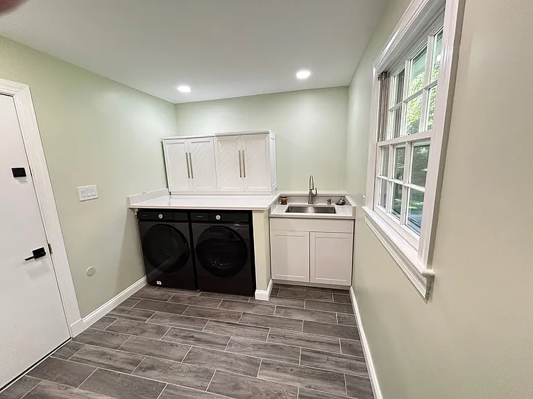 Laundry room (directly off the kitchen and living room).