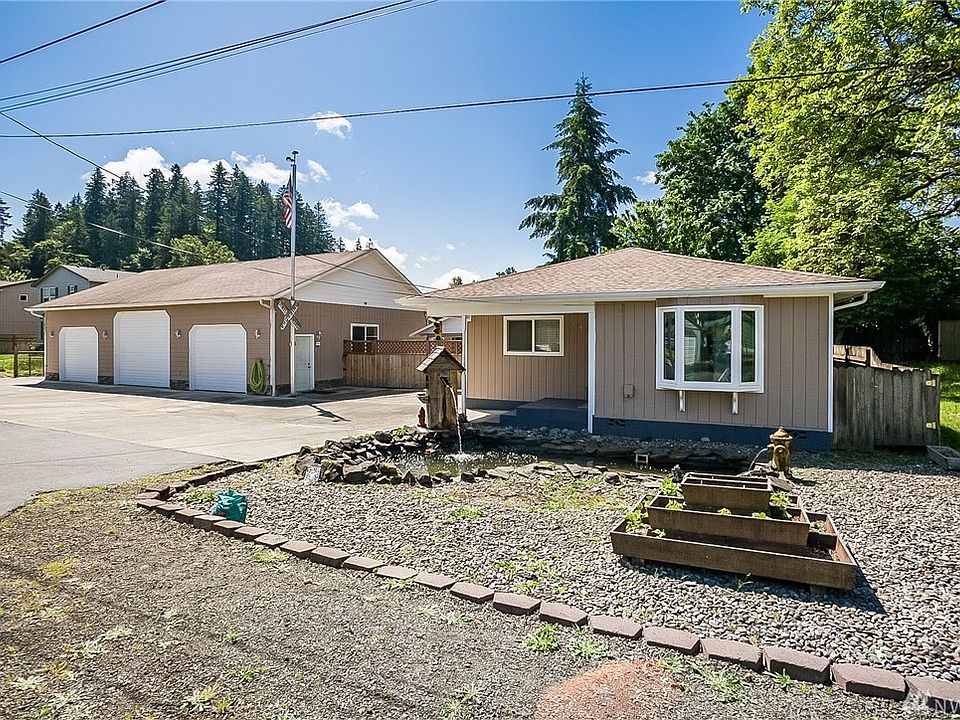 Updated home on 2.5 city lots!