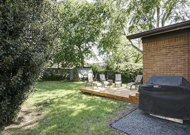 Private fenced backyard with patio.