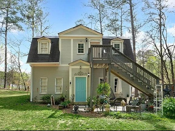 Blue door is the lower unit with patio