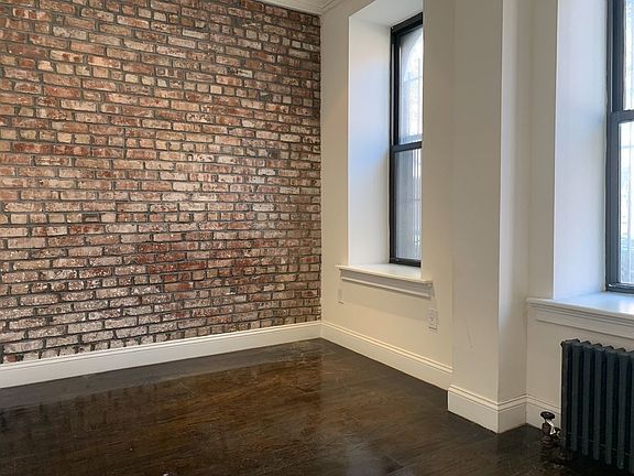 3rd image of 50 E 3rd St #A1