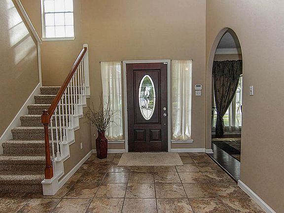 Inside you find 18" tile floors that extend through the entire first floor with the exception of the dining room.