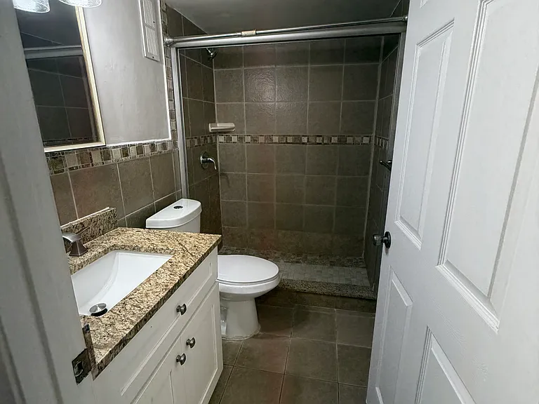 7710 NW 50th St #304 — Photo 11
