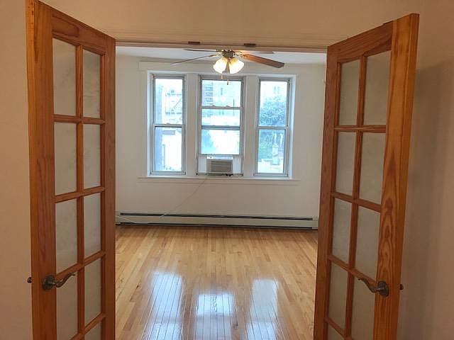 Sunny bedroom with french doors