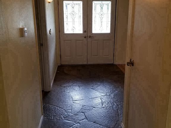 Stone Entry, master on left, living room/dining room on righ