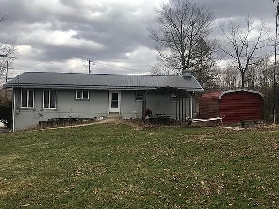 Back of house, pavilion area and large storage building