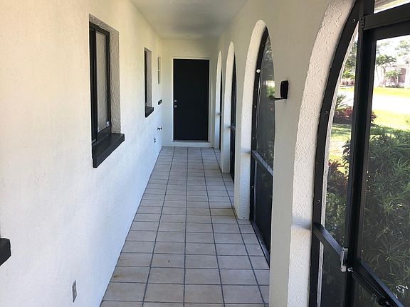 Shared walkway (viewing other unit's door)