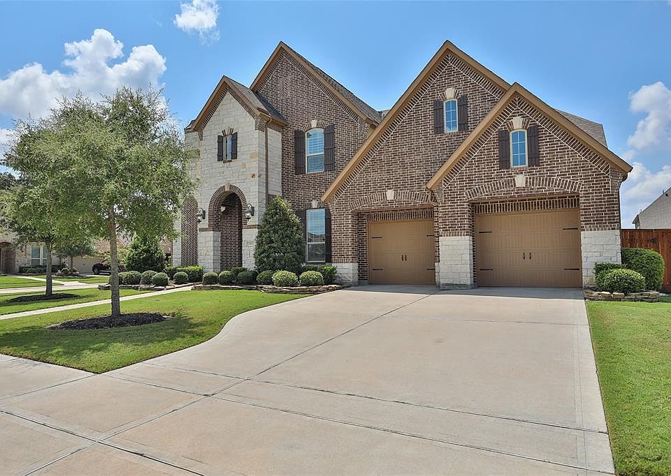 23803 Dolci Lane is set in beautiful Lakes of Bella Terra.