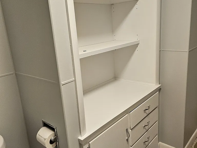 Freshly painted bathroom built-ins.