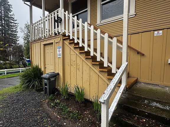 Stairs to apartment and the storage below