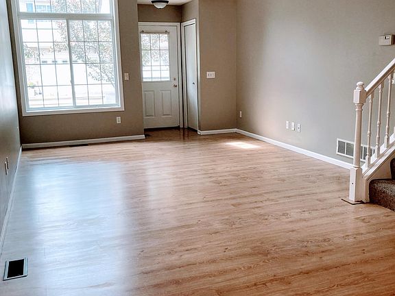 Entry way & with vaulted ceiling & living space