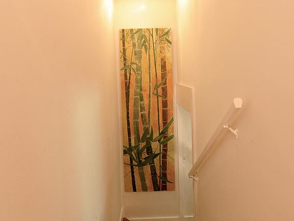 stairs going from master bedroom to living room