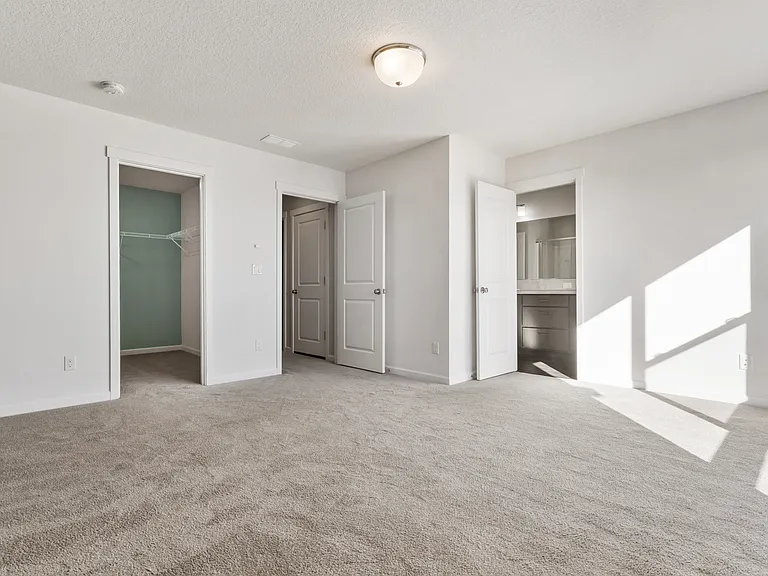 Master Bedroom with attached Bathroom and Walk-In Closet