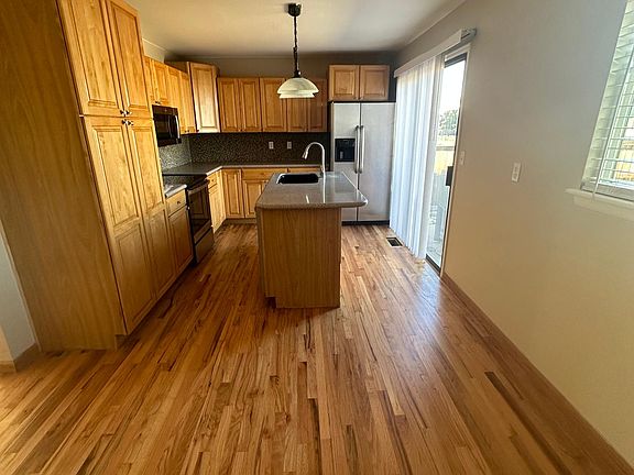 Dining area looking into kitchen