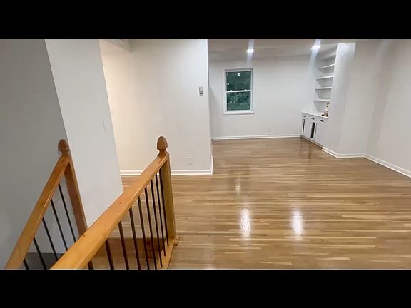 Large open area for a dining and living room. All new floors and fresh paint.