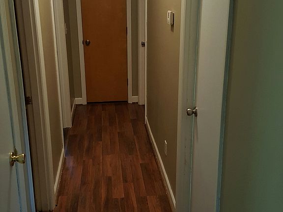 Hall way to 3 bedrooms