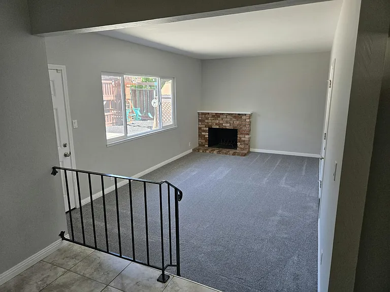 Back Family Room 18'4" x 10'11"