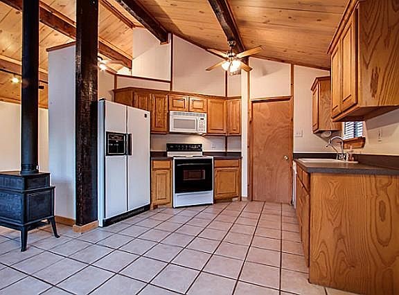 Nice open kitchen with cast iron stove