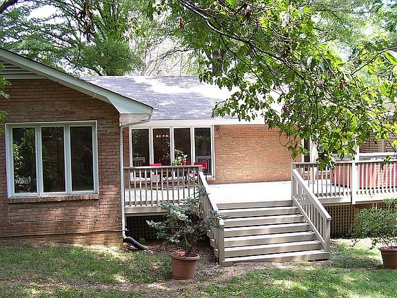 Large deck off the family room for dining, relaxing with hot tub.