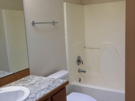 Large bathroom with skylight.