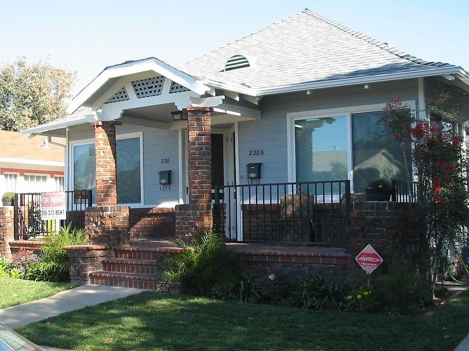 Front of the Duplex - Gardener is pd by owner