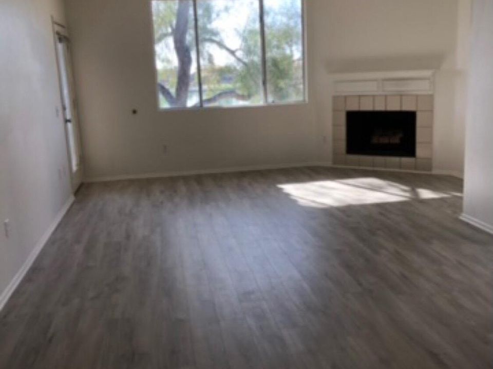 Great Room and Fireplace with View to Lake