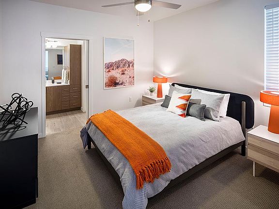 Bedrooms include ceiling fans and carpeted floors