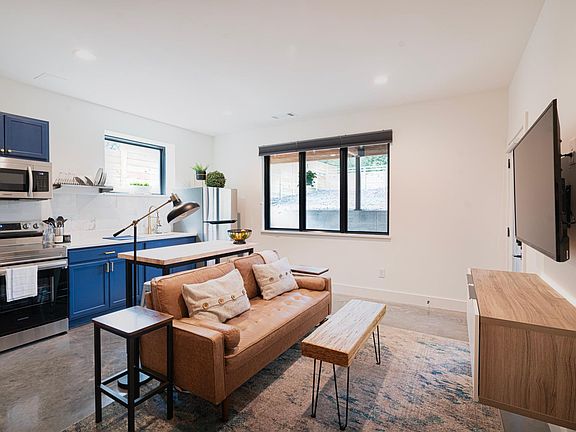 Enjoy our Smart 48" tv with complimentary Netflix, HBO Max, and Hulu. Work on your business at our work station with charging stations.