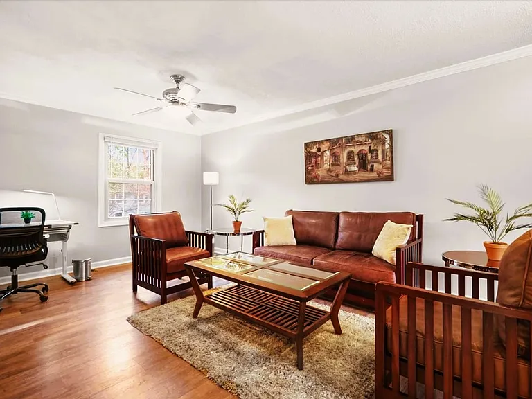 This room has a wet bar and is currently configured as a lounge with an office desk and high-speed internet. It can be converted into another bedroom or playroom. (Some board games, puzzles, and books are provided)