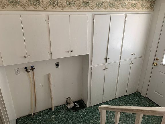Laundry room with built ins