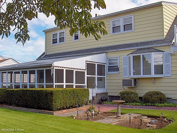 Rear Dormer & Enclosed Patio