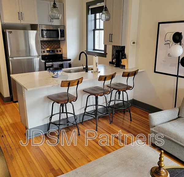 630 E 16th Ave #202 — Photo 1