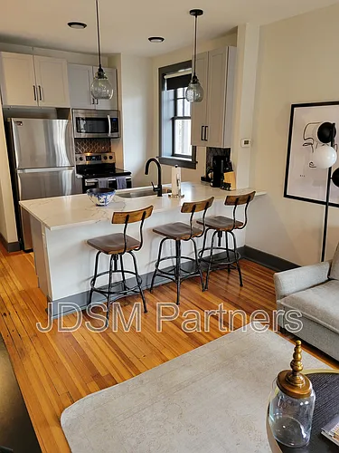 630 E 16th Ave #202 Photo 1