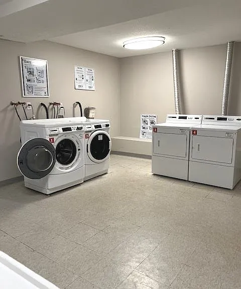 LOWER LEVEL- IS SHARED LAUNDRY/COIN OP