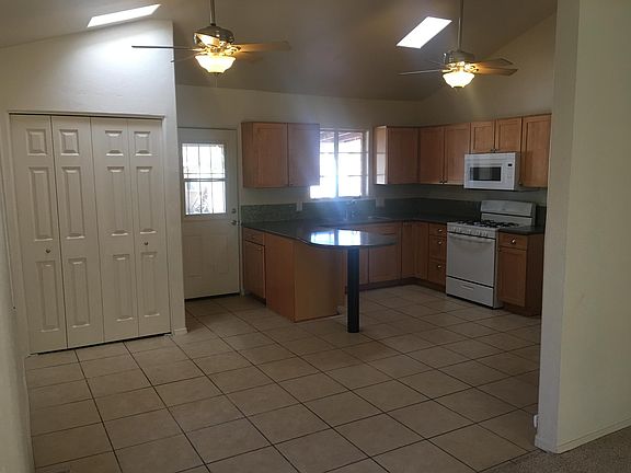Kitchen w/ Vaulted Ceilings