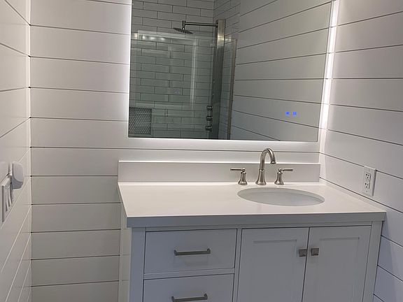 bathroom vanity with five (5) drawers for extra storage.