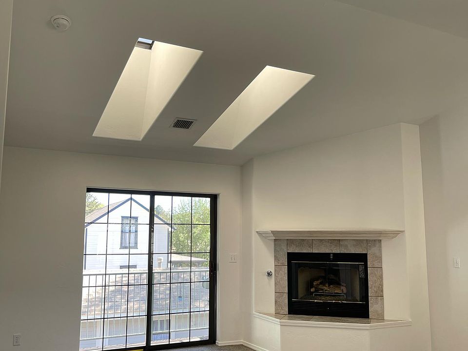Airy living room with skylights and lots of natural light.