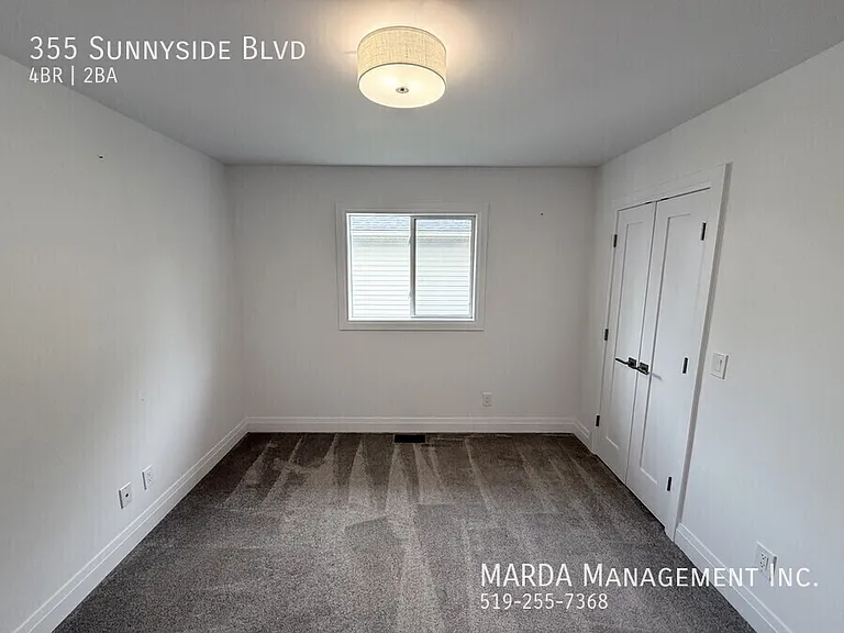355 Sunnyside Blvd — Photo 24