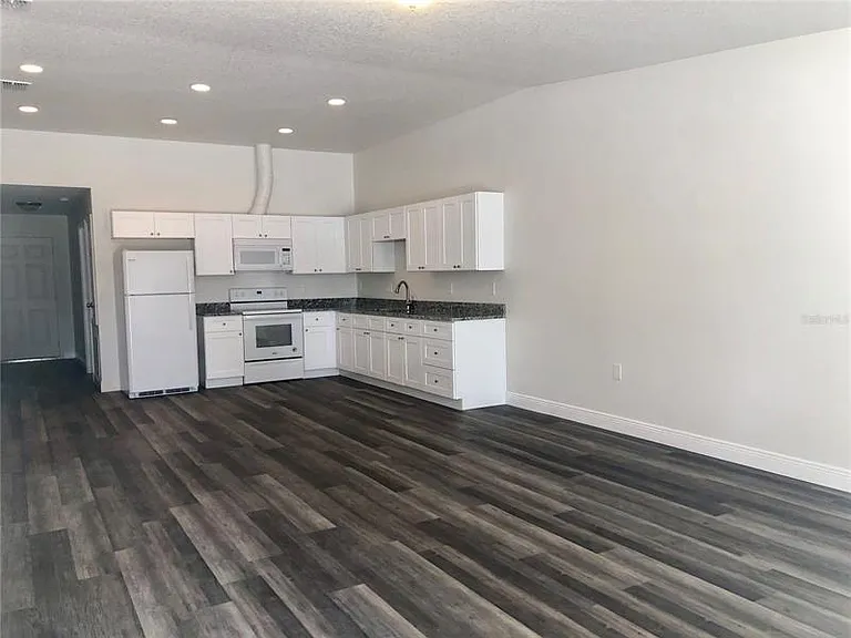 1308 Magnolia Manor Pl — Photo 14