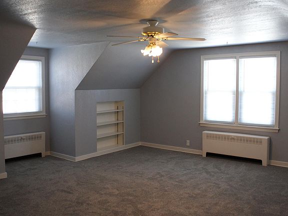 Bedroom 2 (carpeted; ceiling fan and lots of storage)